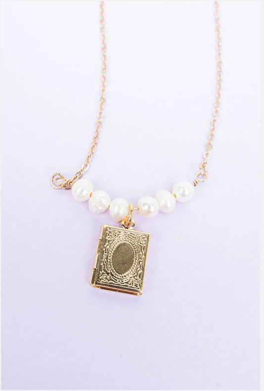 AN OPEN BOOK GOLDTONE & PEARL LOCKET NECKLACE