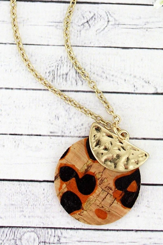 CRAVE GOLDTONE HALF MOON AND LEOPARD CORK LAYERED DISK NECKLACE