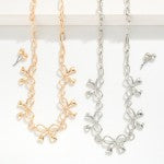 Chain Link Necklace Featuring Metal Tone Bow Stations