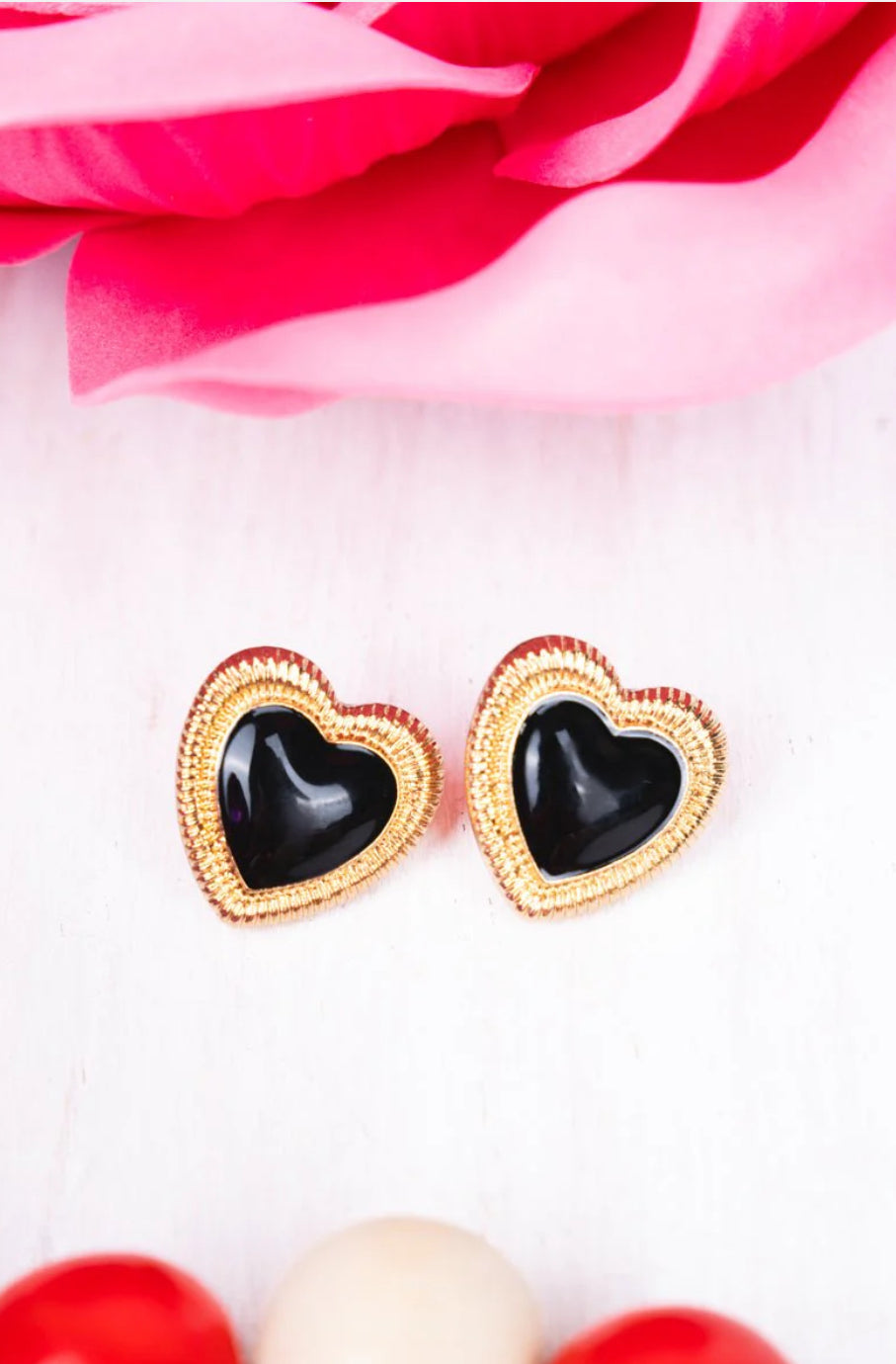 BLACK AND GOLDTONE MINA HEART EARRINGS