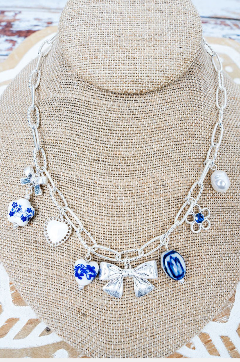 BLUE PETAL REVERIE SILVERTONE CHARM NECKLACE