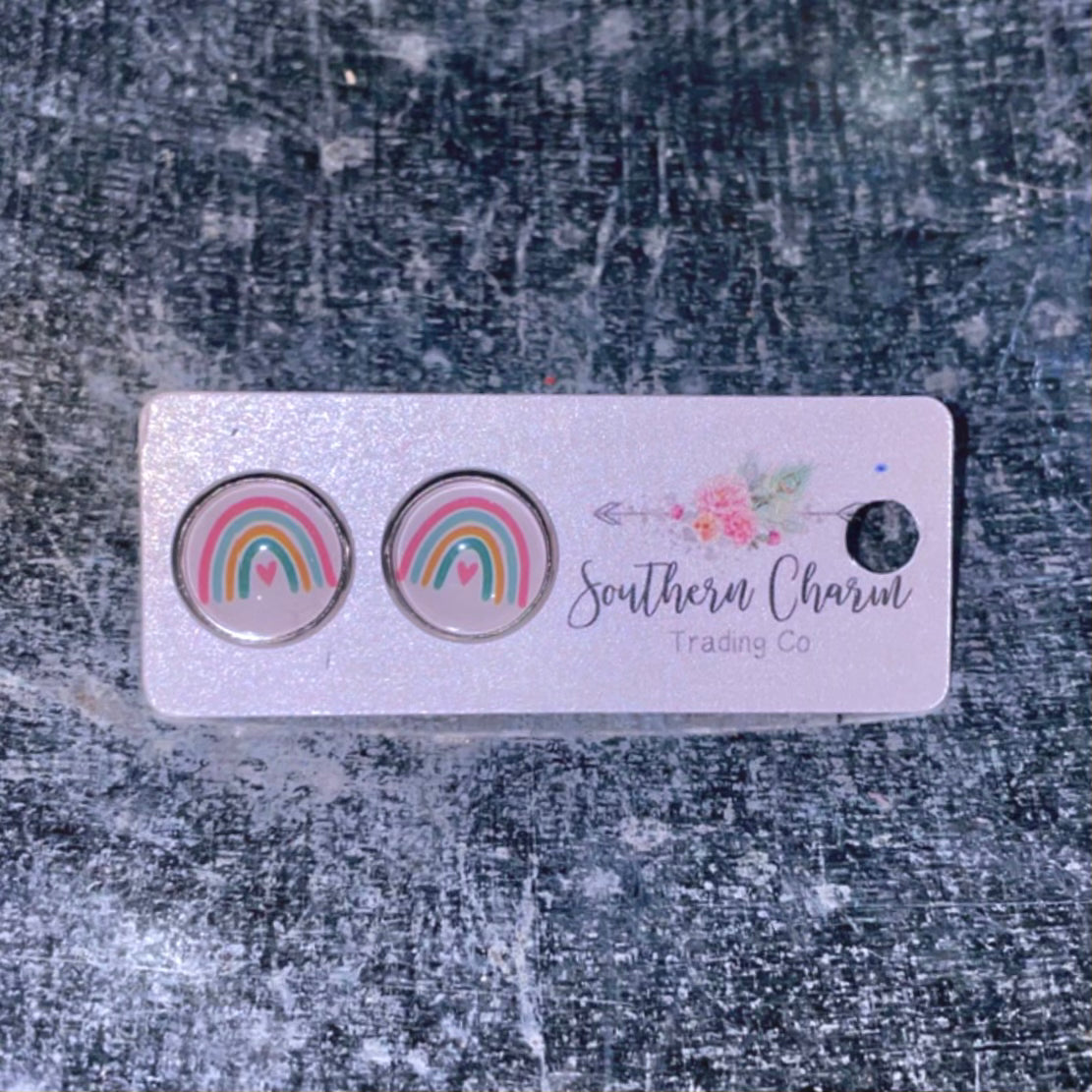 Rainbow stud earrings representing save the children campaign